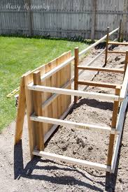 This wooden outdoor decor measures 24 wide and stands 30 tall. Planter Box Fence Stacy Risenmay