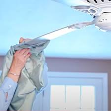 to clean a ceiling fan with a pillow case