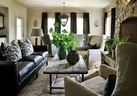 Living Room With A Black Leather Sofa