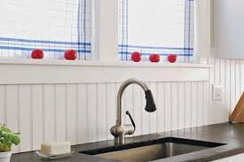 A wood backsplash in the kitchen can bring in needed warmth and color. How To Install A Solid Surface Backsplash This Old House