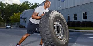 boost your fat loss with strongman training