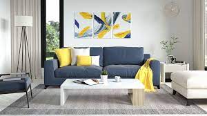 how to decorate around a navy blue sofa