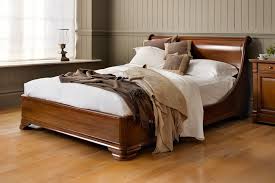 luxury manoir socle wooden sleigh bed