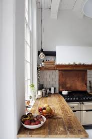 Penny stove backsplash.for the love of copper! 39 Trendy And Chic Copper Kitchen Backsplashes Digsdigs