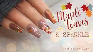 maple leaves fall sparkle nail design