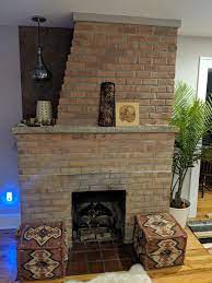 oddly shaped brick fireplace