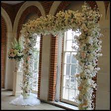 While many couples might prefer to build their wedding arch from wood, the classic white metal arch is still very popular. Wedding Flowers Arch Hire The Fine Flower Company