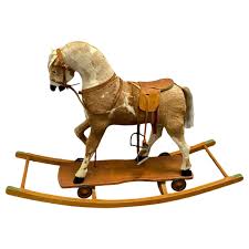 rocking horse and pull toy antique