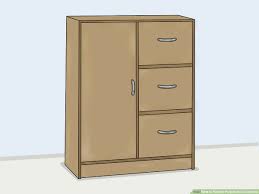 how to refinish particle board cabinets