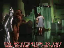 the wizard of oz behind the curtain gif