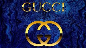 gucci word with logo in blue background