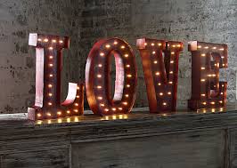 Spread peace, love and joy this holiday season with lit decor that conveys a meaningful message. Led Wall Art Battery Operated 12 Inch Lighted Metal Letters Love