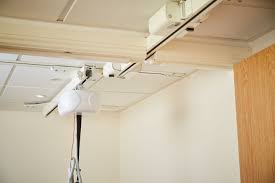 what is a ceiling track hoist and how