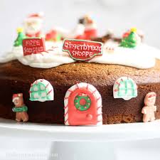 Grease a bundt cake pan with shortening, then dust it with flour. Gingerbread Bundt Cake With Icing Decorated For Christmas