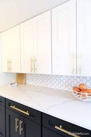 I looked at your pictures and have to admit that i don't like the black on the bottom and white on top. Light Cabinets On Top Dark Cabinets On The Bottom The Perfect Two Toned Kitchen This Helps Create Inter Kitchen Design Modern Kitchen Modern Kitchen Design