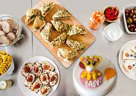 Finger sandwiches and deli, fruit, or vegetable trays are staple tea items, as well as a variety of desserts, such as cake, brownies, and cookies. Creative Baby Shower Brunch Menu Ideas Lovetoknow