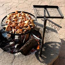 What is an outdoor fire pit and what styles exist? Sunnydaze Dual Campfire Cooking Grill Grate Swivel System Outdoor Adjustable Fire Pit Bbq Grilling Barbecue Grills Outdoor Cooking Patio Lawn Garden Urbytus Com