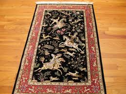 qum hunt scene persian rug