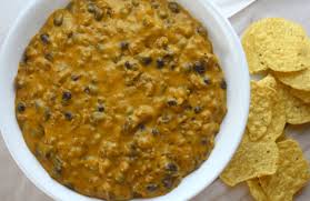 Hamburger meat browned and drain grease • block of velveeta cheese cubes up (use half for a smaller crockpot) for more cheesy use 2 blocks of cheese • big jar of pace picante sauce (or 2 smaller jars) • fiesta nacho cheese soup Velveeta Cheese Dip With Beans Recipe These Old Cookbooks