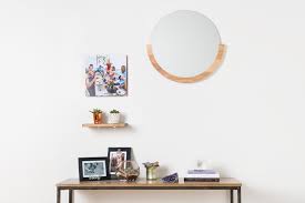 tips on how high to hang a mirror for