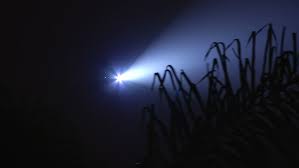 police helicopter searchlight searches