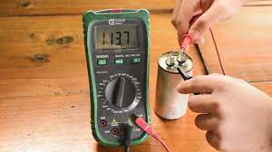 ac capacitor with multimeter and voltmeter