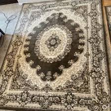2 large area rugs in