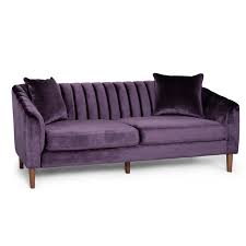 A Purple Velvet Couch With Vintage