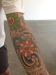 His parents often had him write reviews on exhibitions he had seen. Murakami Flower Tattoo 2020