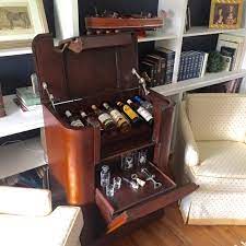A diy liquor cabinet at home can go a long way in organizing your cocktail making supplies and accessories. The Speakeasy Tm Antique Radio Hidden Liquor Cabinet Bar Patents Pending Hidden Liquor Cabinet Antique Radio Vintage Radio Cabinet
