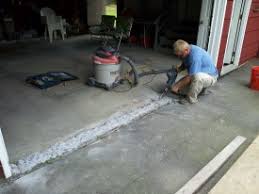 repaired concrete at the garage door openings