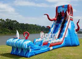 Beachfront bonanza kids inflatable outdoor backyard mega water slide splash park toy with slide, climbing wall, sprayer, and kiddie pool. 0 55mm Pvc Tarpaulin 25 Ft Ocean Battle Slide Inflatable Adults Water Slide For Backyard