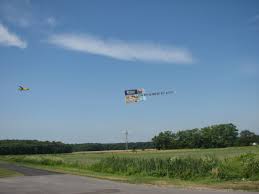 banner towing by ocean aerial ads