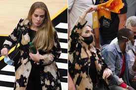 Adele rocks stylish outfit while making rare appearance at nba finals game in arizona. Mahfy0zw Qtqvm