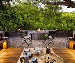 Outdoor Spaces With Warming Fireplaces