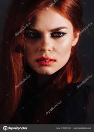 red haired woman bright makeup face