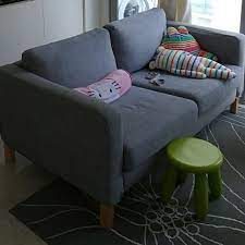2 seater sofa with isunda gray cover