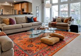 layering rugs on top of other rugs in