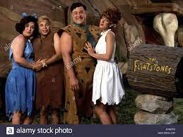 Flintstones Familie Feuerstein Flintstones, Betty-Geroellheimer (Rosie  O'Donell), Barney (Rick Moranis), Fred (John sterben Stockfotografie - Alamy