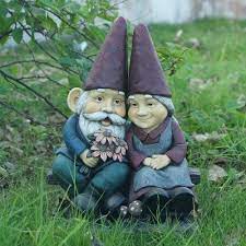 gnome old couple on bench statue