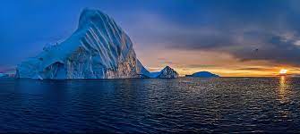 white iceberg nature sky sea water
