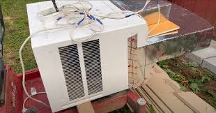 turning a window air conditioning unit