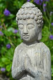 Close Up Of Grey Stone Buddha Statue