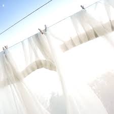 how do you wash curtains without