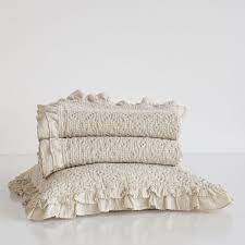 frilly bedspread with a raised design