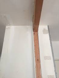 open floor plan support beam dry wall