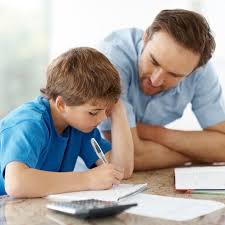 Too much help with homework can hinder your child s learning progress Tommy Pepper     doing his homework with the help of his dad Shaun 