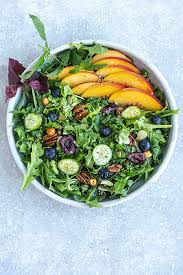 Arugula Salad With Red Cabbage Pomegranate Orange And Pineapples