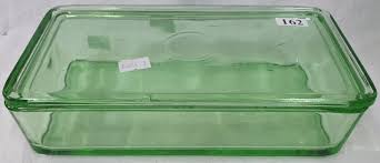 A Green Depression Glass Food Container
