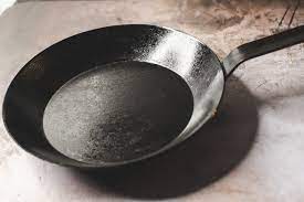 seasoning cast iron and carbon steel